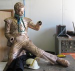 Kneeling soldier under construction
